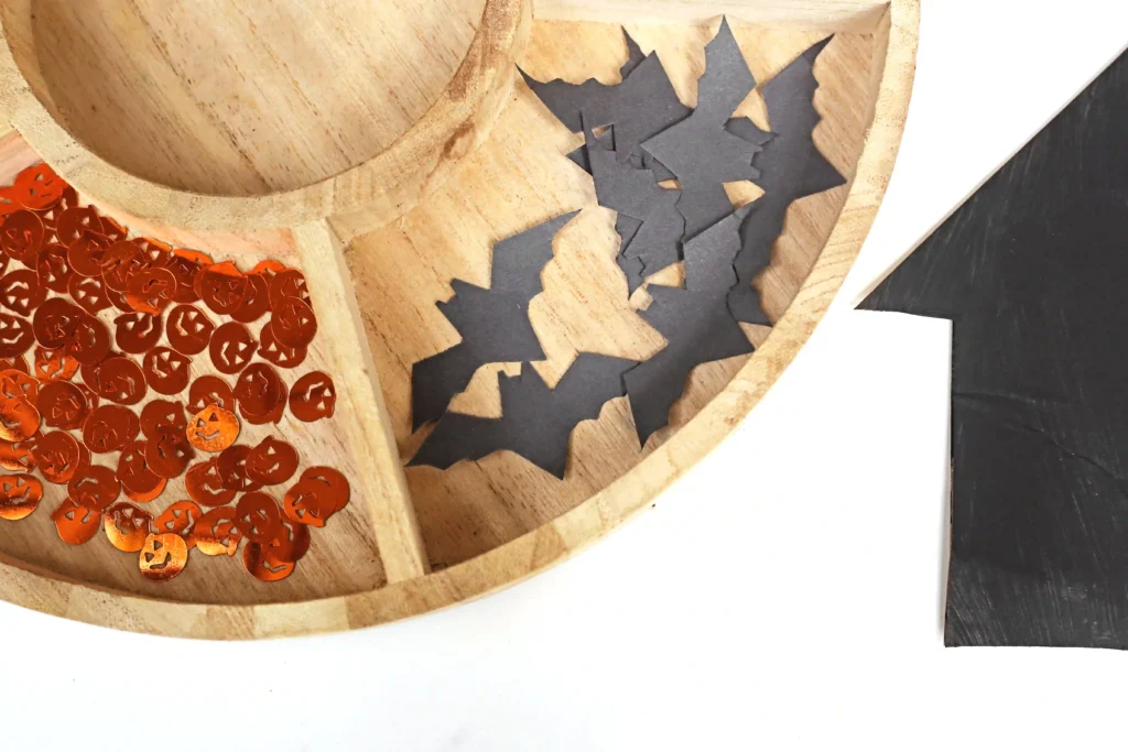 bats cut out of black construction paper