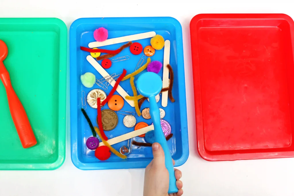 a Magnetic Sorting STEM Activity where a kid uses a magnet to determine what is magnetic and what isn't
