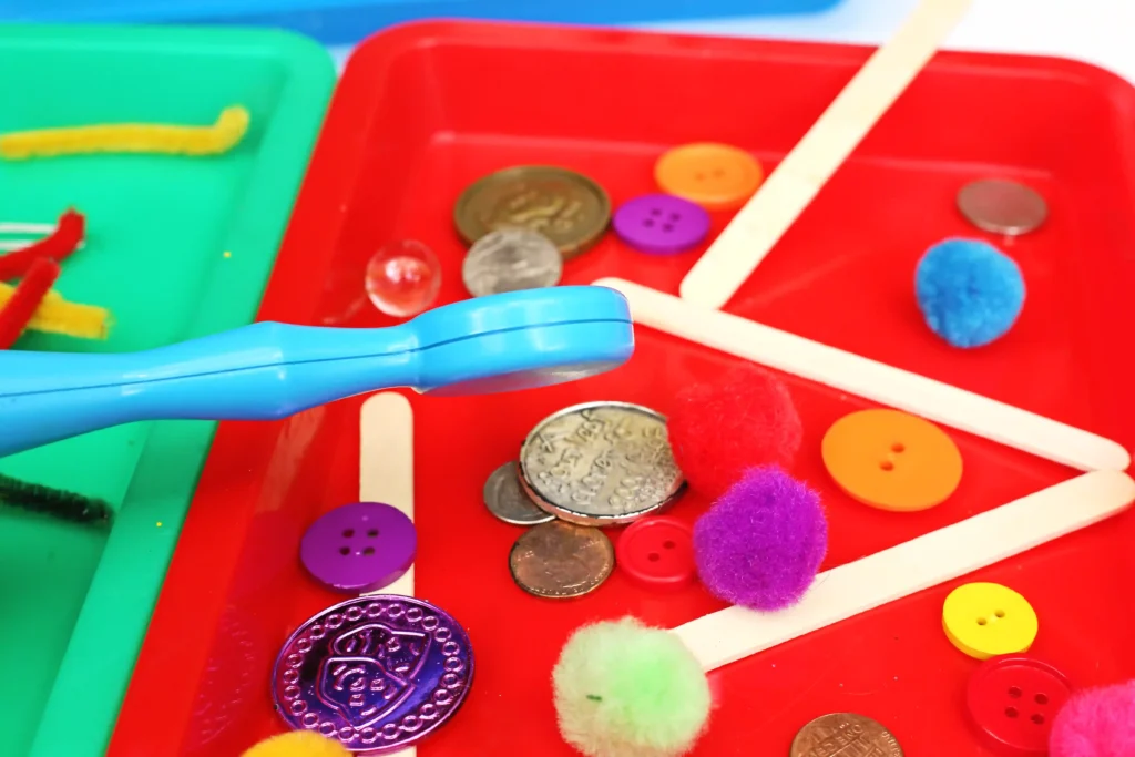 a Magnetic Sorting STEM Activity where a kid uses a magnet to determine what is magnetic and what isn't