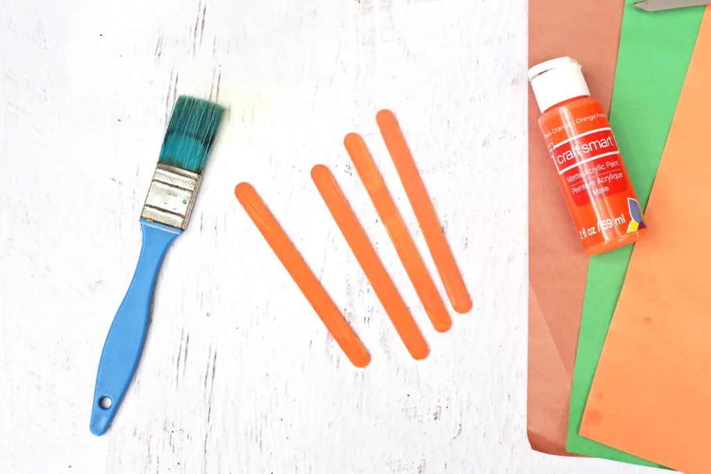 popsicle sticks painted orange
