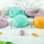 homemade playdough recipe that makes blue, purple, and orange playdough for kids