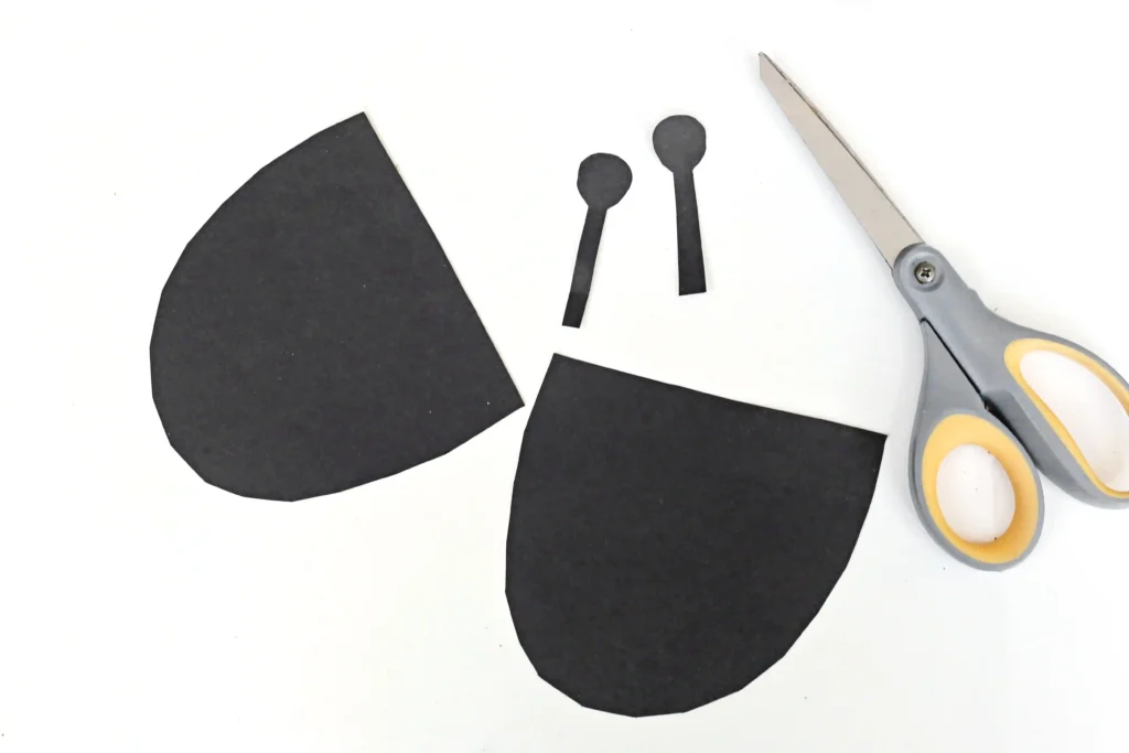 wings and antennae cut out of black construction paper