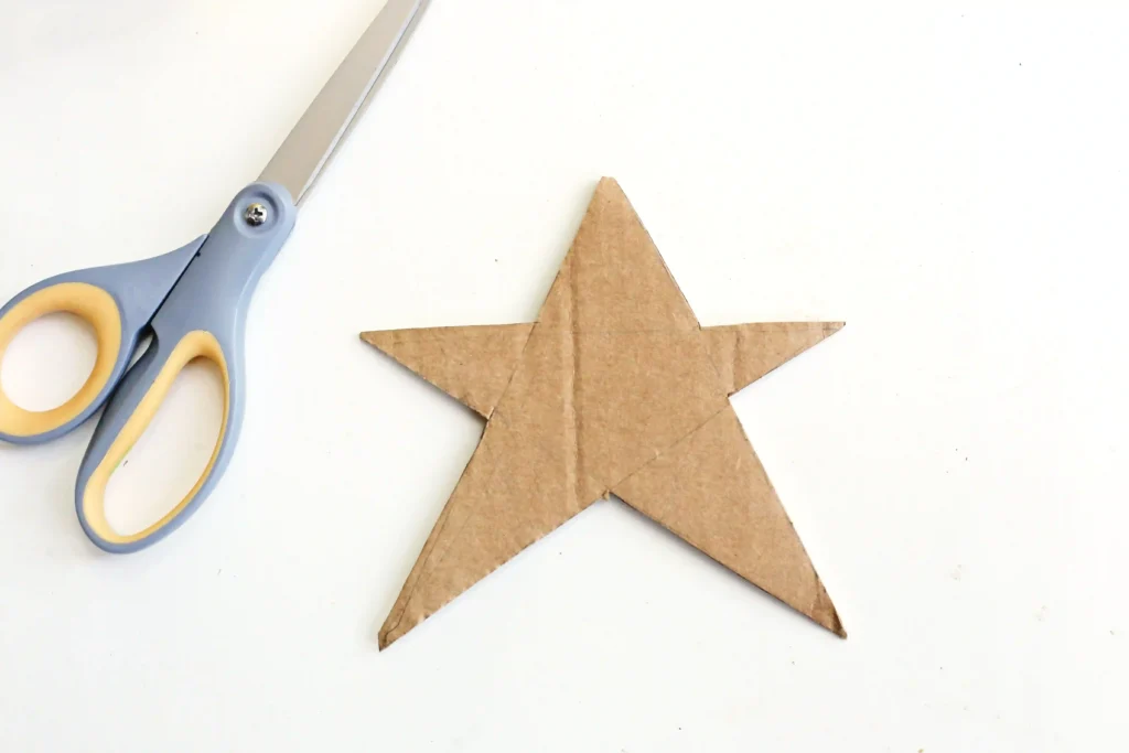 a star cut out of cardboard