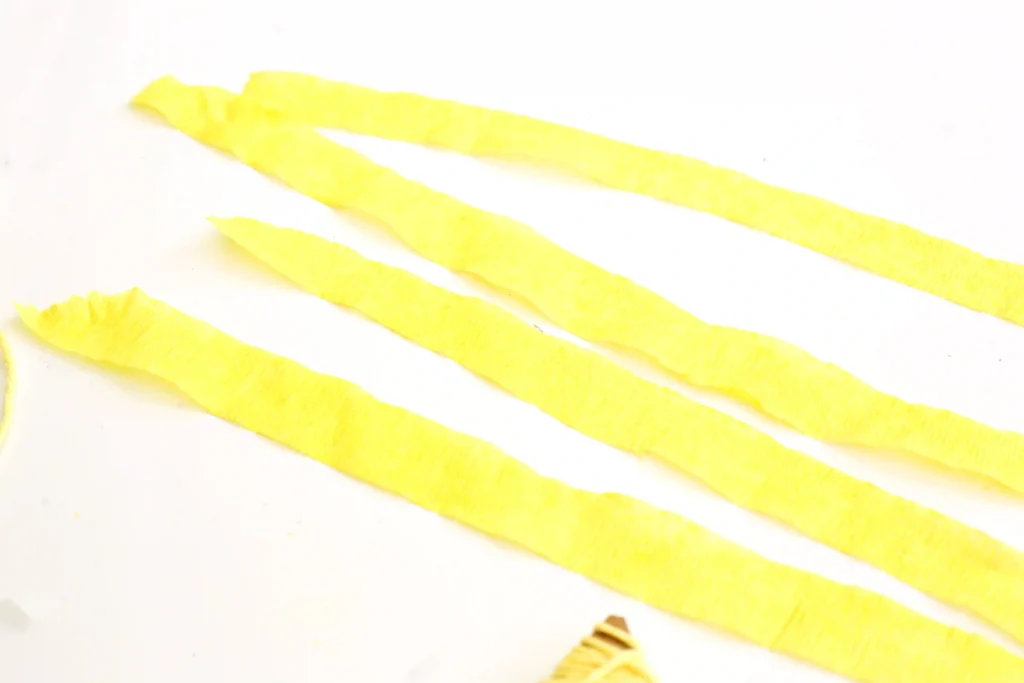 yellow streamer cut into strips