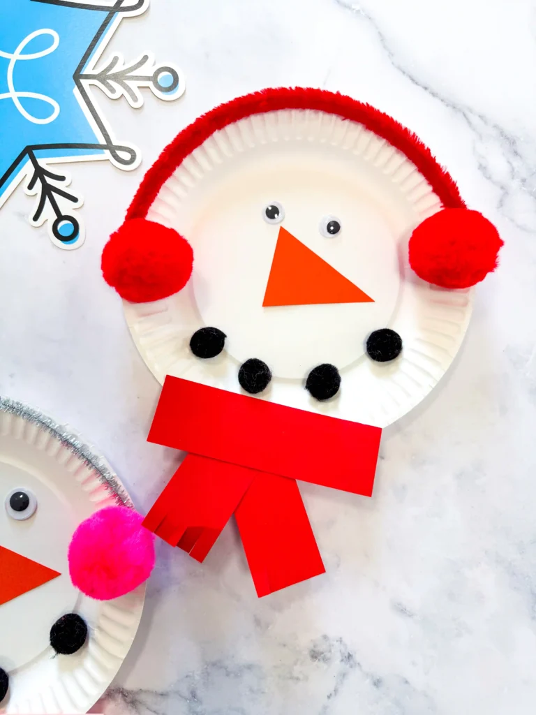 paper plates decorated to look like snowmen