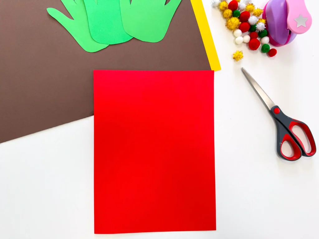red construction paper folded in half