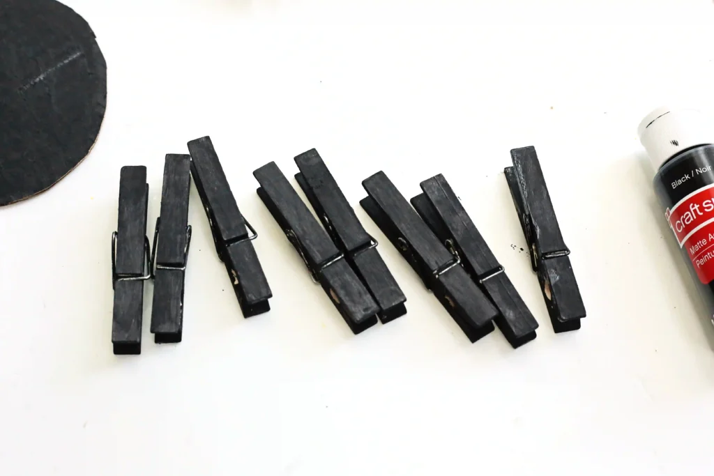 clothespins painted black