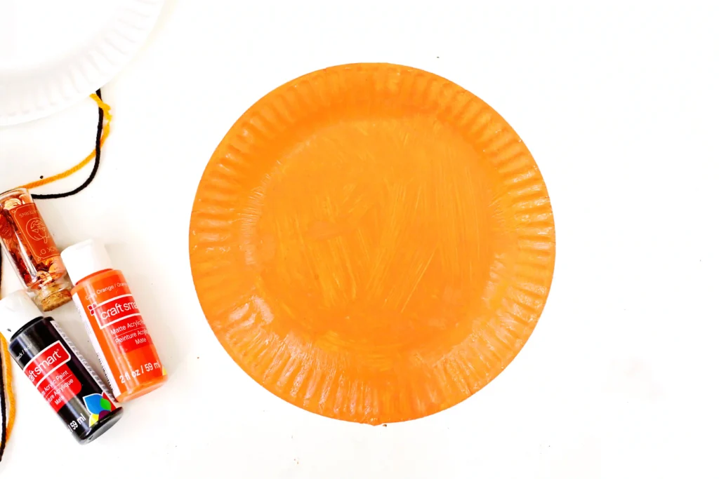 a paper plate painted orange