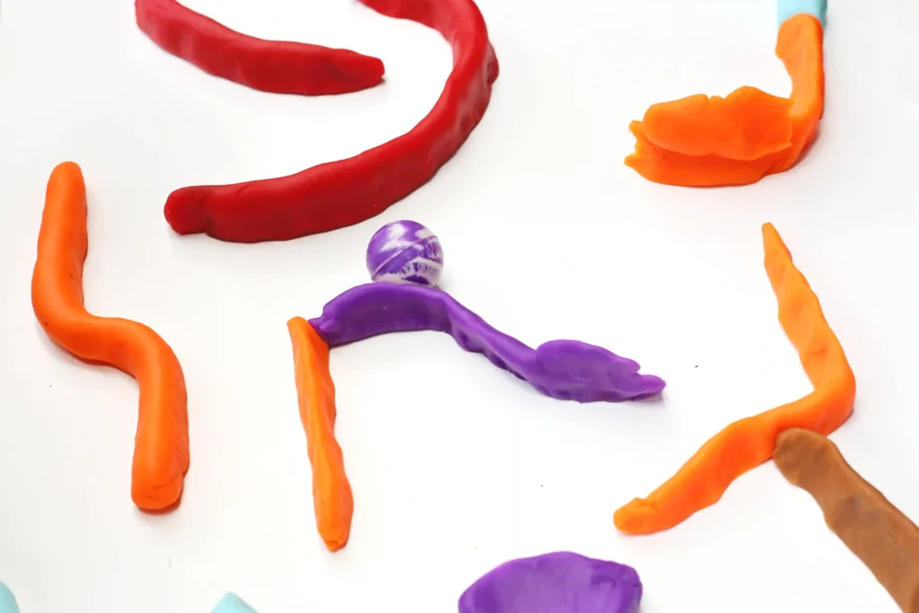 playdough pinball - a pinball game made out of playdough with a marble