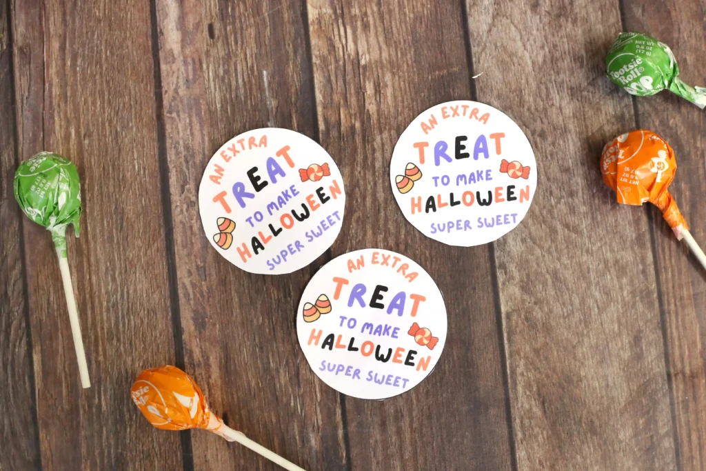 Printable Halloween tags that read "an extra treat to make halloween super sweet"
