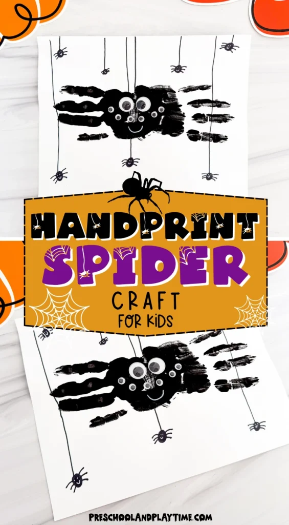 a Spider Handprint Craft on a piece of paper on a marbled surface