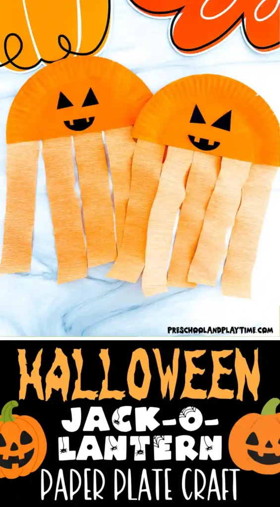 Half a paper plate painted orange with a jack-o-lantern face and orange streamers