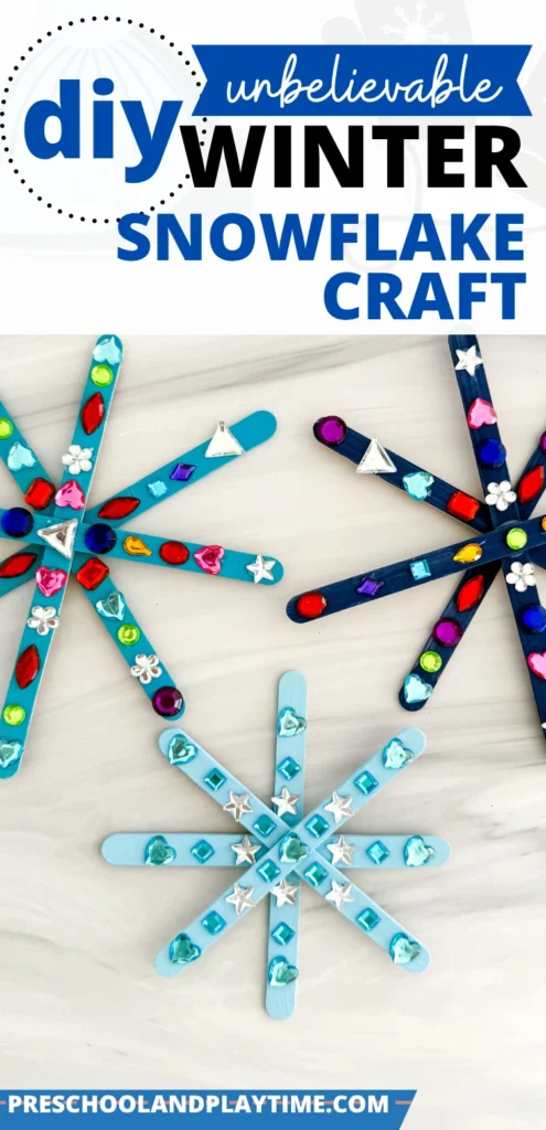 popsicle sticks painted blue and glued together to look like snowflakes with gems on them