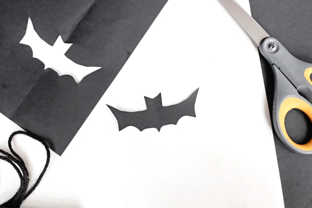 a bat cut out of black construction paper