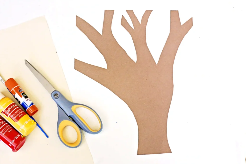 a tree cut out of brown construction paper