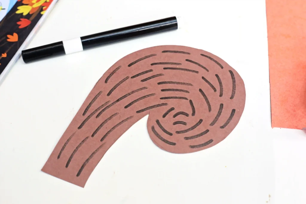 a squirrel tail cut out of construction paper