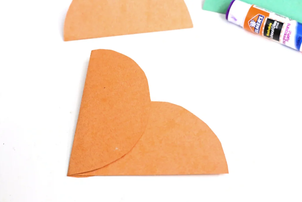 two orange circled glued together