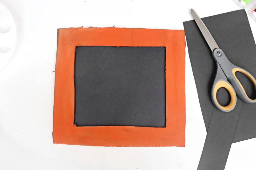 a frame made out of construction paper and cardboard