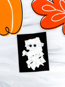 a Mummy Handprint Craft with streamer and googly eyes