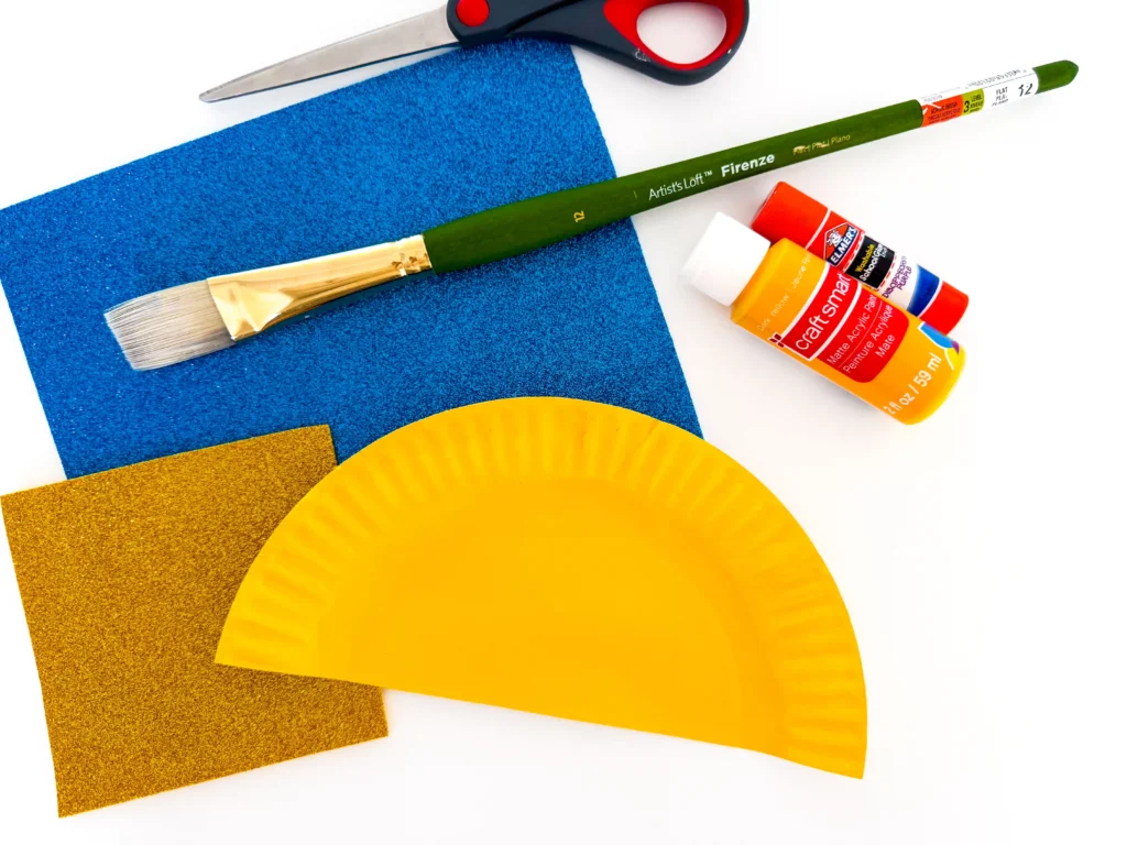 half a paper plate painted yellow
