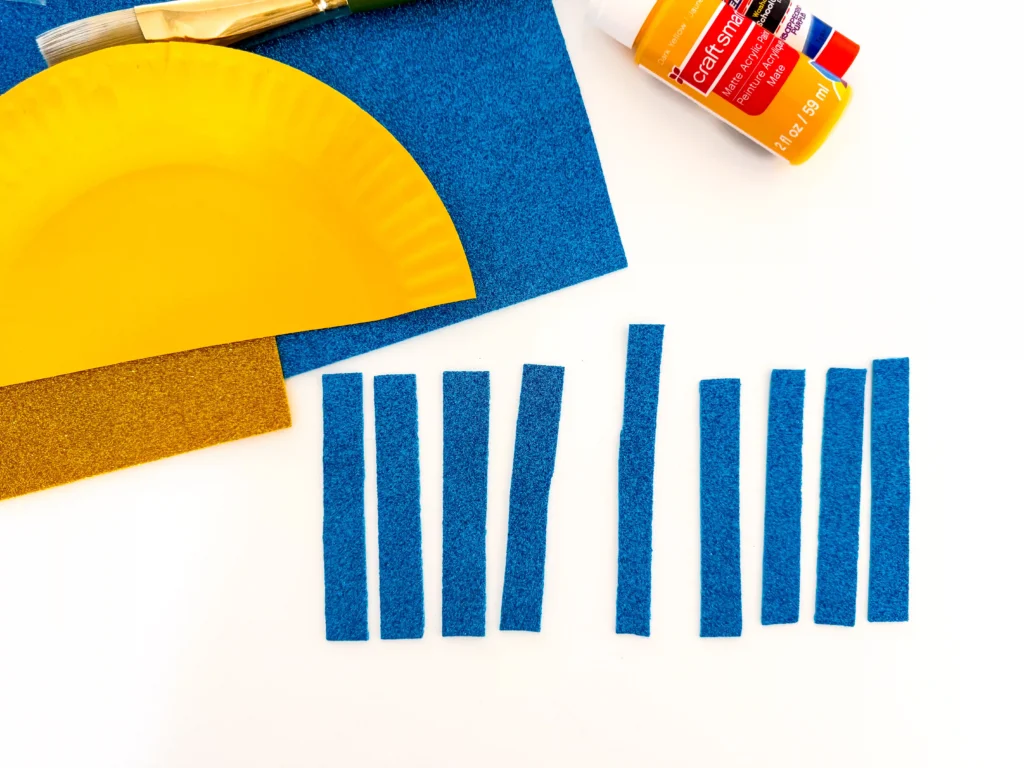 rectangles cut out of blue glitter paper