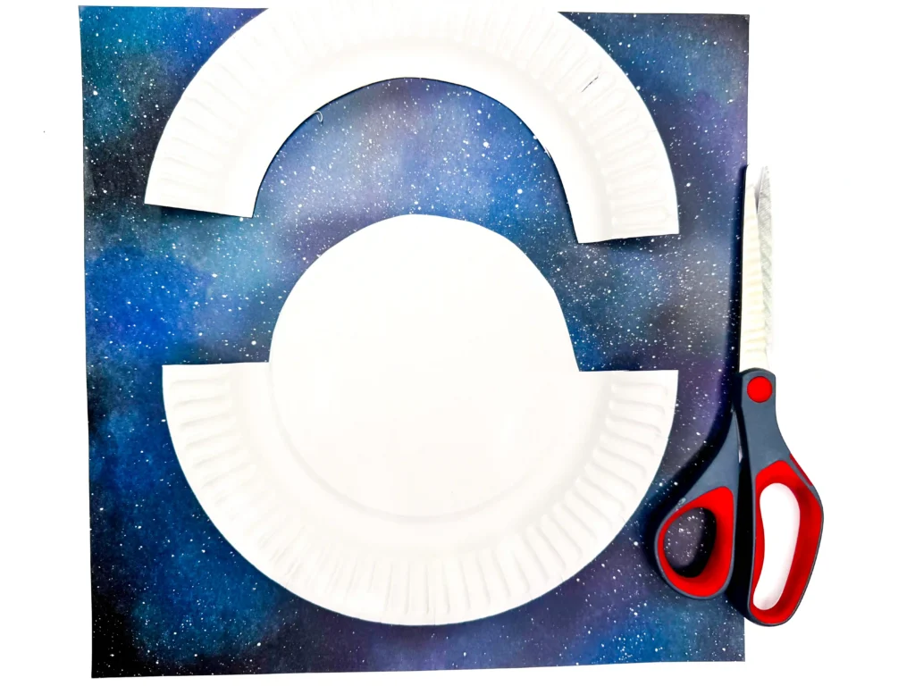 a paper plate cut to look like a UFO