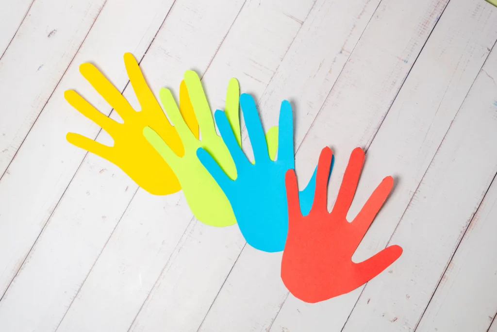 handprints cut out of colored paper