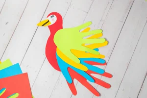 a Parrot Handprint Craft made out of colored construction paper