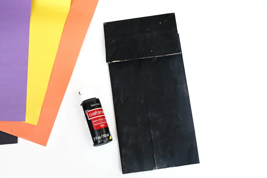 a paper bag painted black