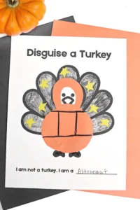 a Disguise A Turkey Astronaut Craft of a turkey with construction paper glued on to look like an astronaut