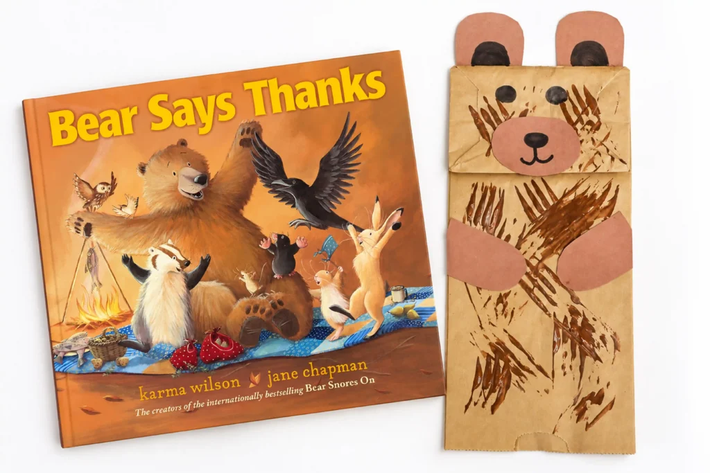 a paper bag decorated to look like a bear next to the book "Bear says thanks"