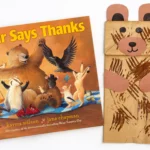 a paper bag decorated to look like a bear next to the book "Bear says thanks"