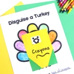 a print out of a turkey with construction paper on top that looks like a box of crayons