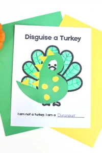 a printout of a turkey decorated to look like a dinosuar