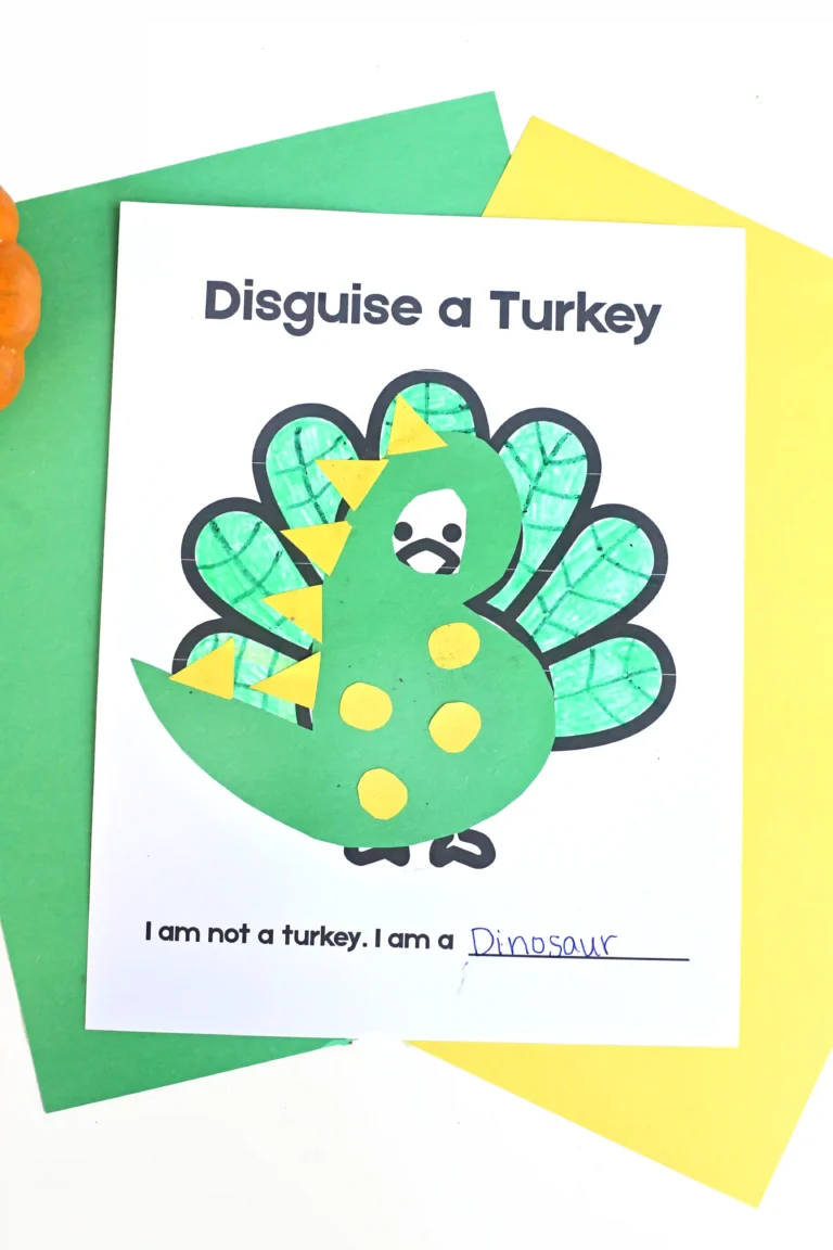 a printout of a turkey decorated to look like a dinosuar
